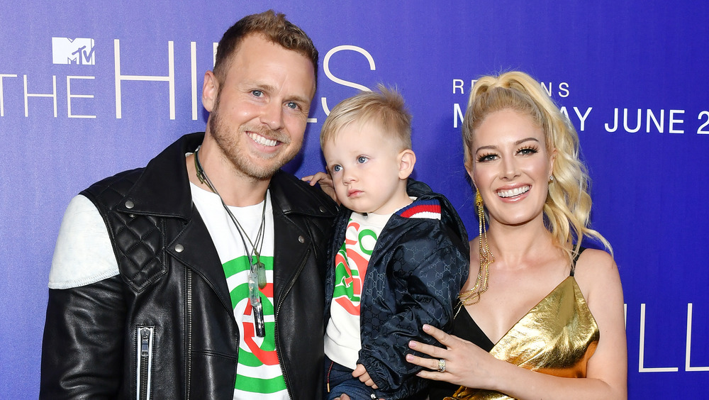 Heidi Montag, Spencer Pratt, and their son at an event 