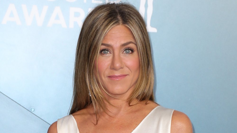 Jennifer Aniston at the 2020 SAG Awards, posing with a small smile