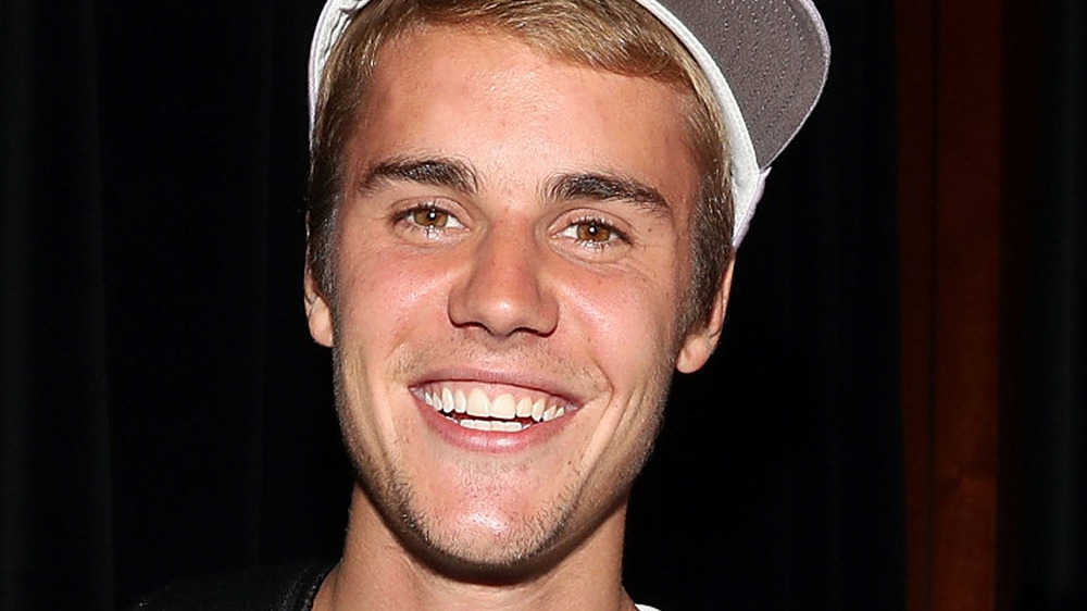 Justin Bieber smiling at an event
