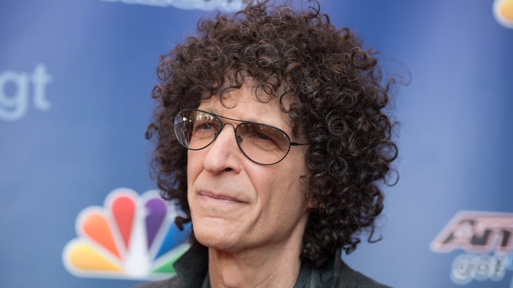 Howard Stern posing on the red carpet