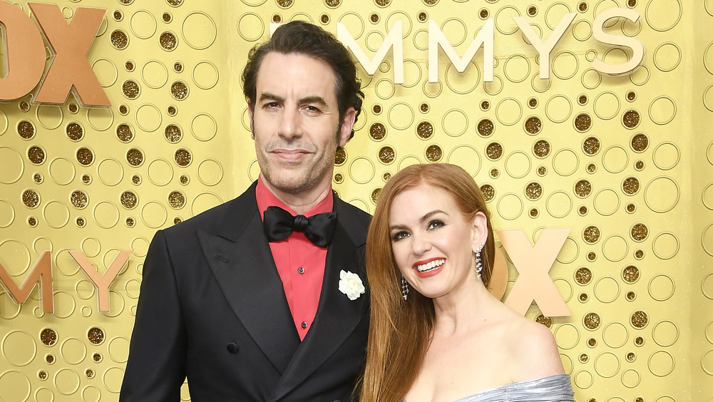 Sacha Baron Cohen and Isla Fisher smiling