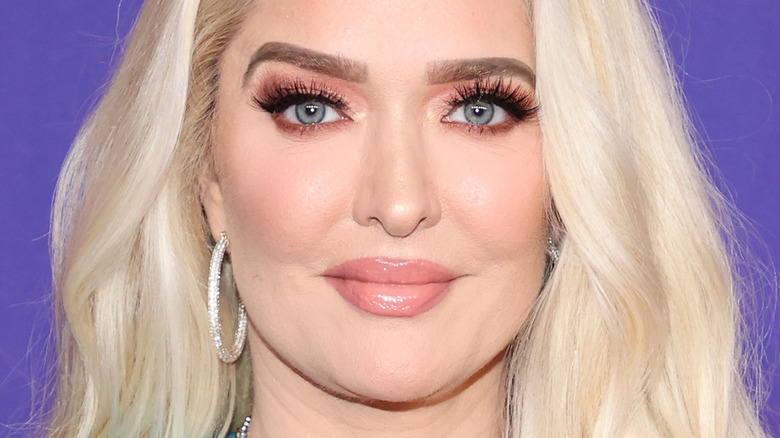 Erika Jayne smiling at camera with lips closed