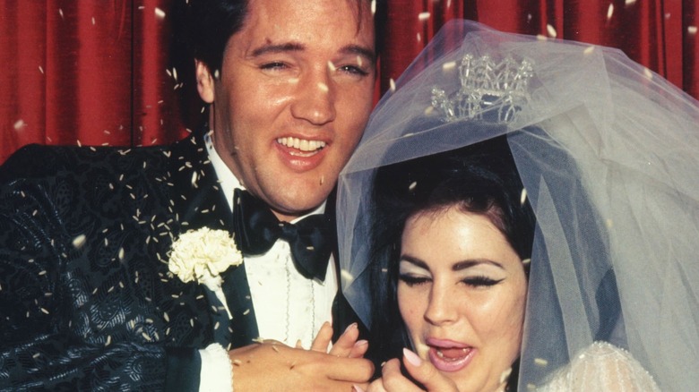 Elvis and Priscilla Presley celebrating