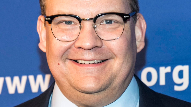 Andy Richter wears glasses