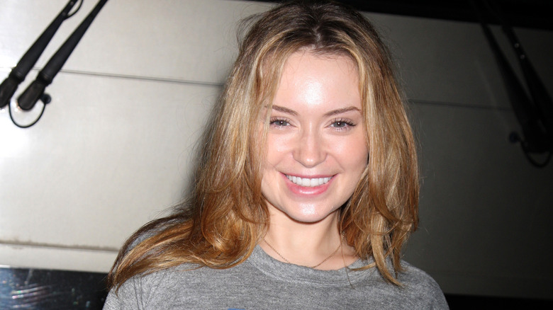 Monica Keena smiling big