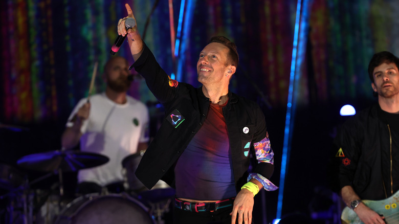 Coldplay performing on stage