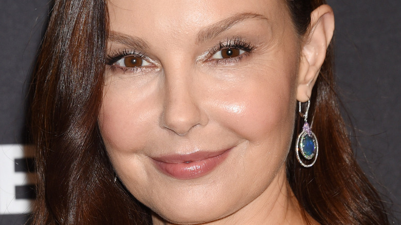 Ashley Judd smiling slightly