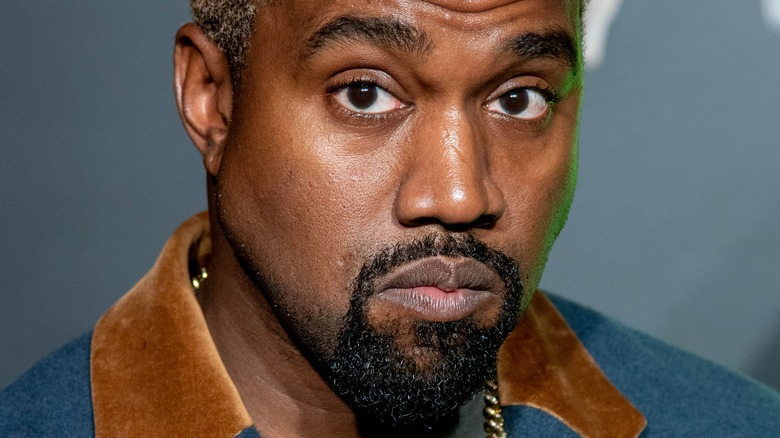 Kanye West wearing a jacket