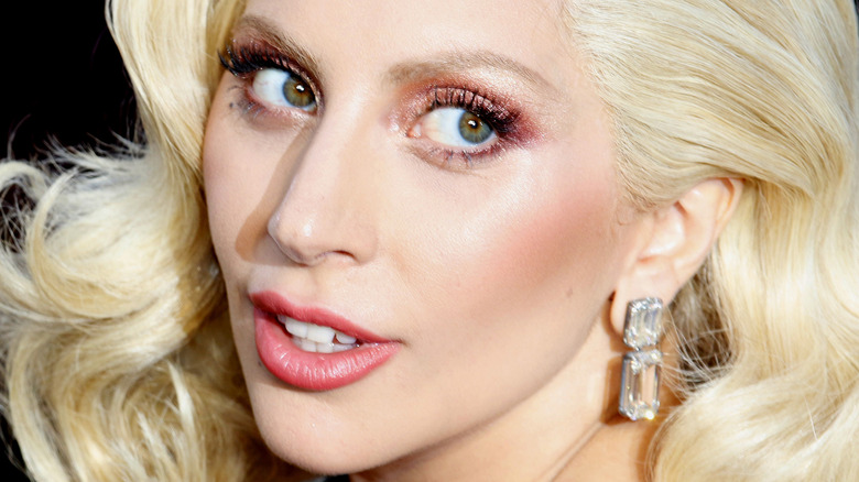Lady Gaga gazing over her shoulder