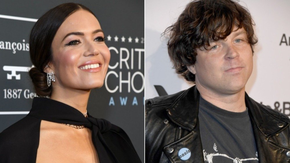 Split image of Mandy Moore smiling, and Ryan Adams with a neutral expression, both wearing black
