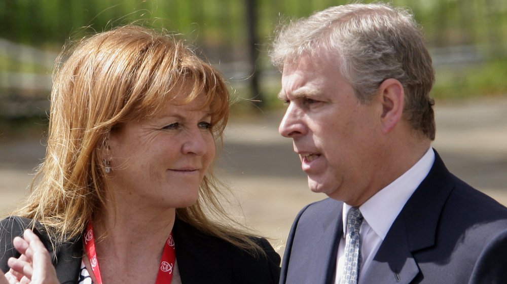 Sarah Ferguson, The Duchess of York talks with ex-husband HRH Prince Andrew, The Duke of York as they wait for daughter HRH Princess Beatrice of York to complete the Virgin London Marathon