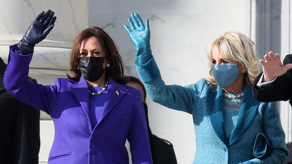 Kamala Harris and Jill Biden wave at the crowd