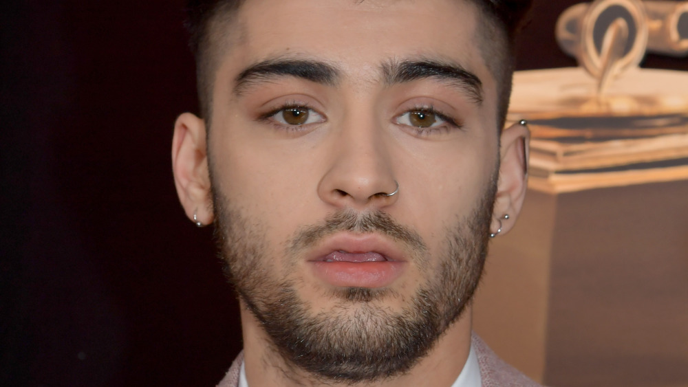 Zayn Malik with a neutral expression