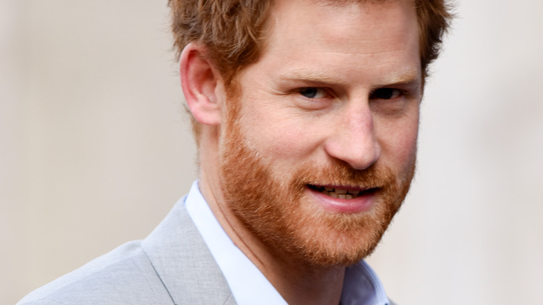 Prince Harry with slight smile looking at camera