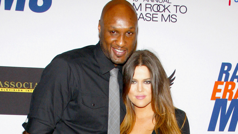 Khloe Kardashian and Lamar Odom posing