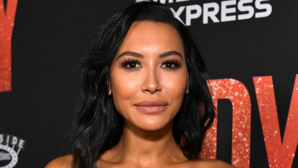 Naya Rivera posing on the red carpet of a premiere