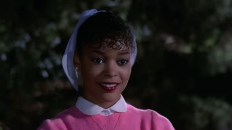 Ola Ray wearing pink