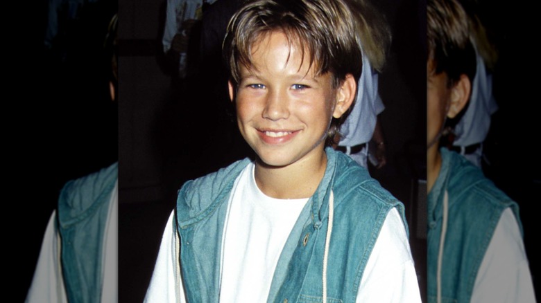 Jonathan Taylor Thomas smiling.