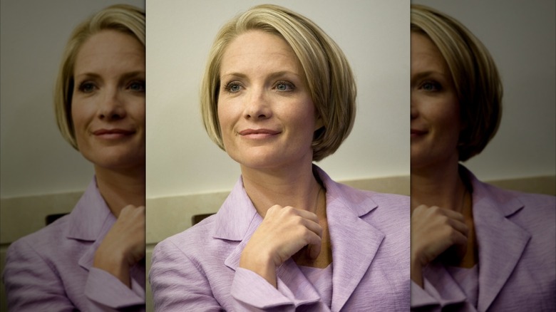 Dana Perino smiling in a lavender suit