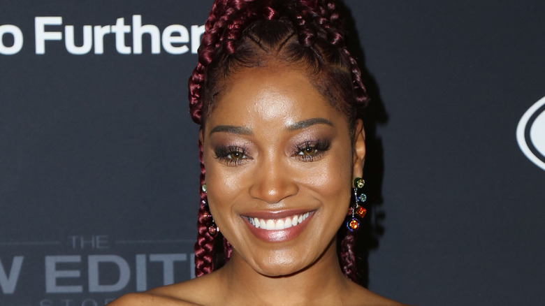 Keke Palmer smiles on the red carpet