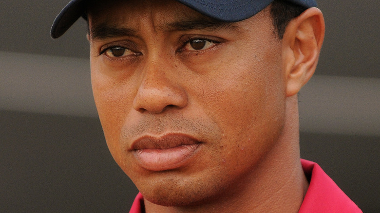 Tiger Woods looking upset