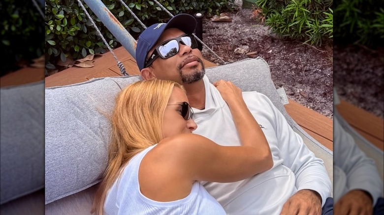 Tiger Wood lying down with Vanessa Trump