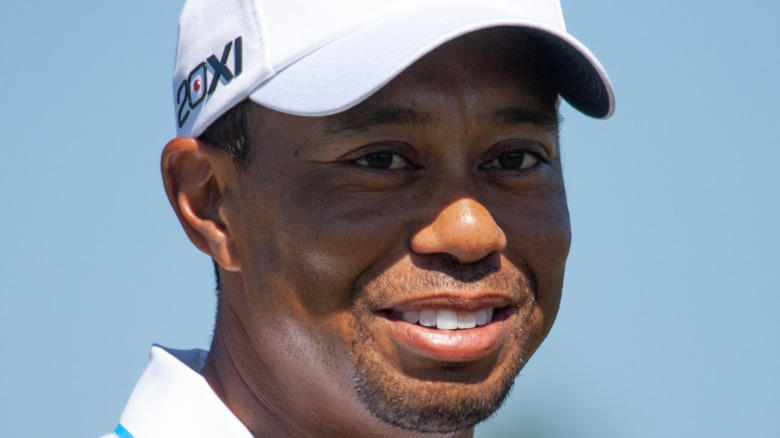 Tigers Woods smiling 