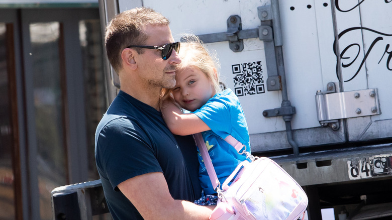 Bradley Cooper holds Lea