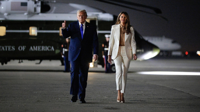 Donald Trump and first lady Melania Trump depart Marine One at John F. Kennedy International Airport.