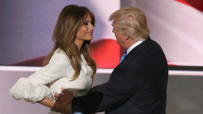 Melania Trump and republican presidential candidate Donald Trump embrace on stage during the Republican National Convention at Quicken Loans Arena on July 18, 2016 in Cleveland, Ohio.