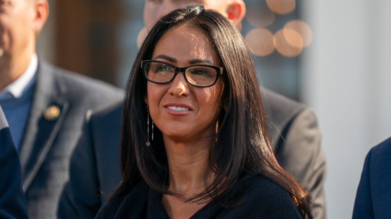 Lauren Boebert smiling outside before Hillary Clinton's deposition.