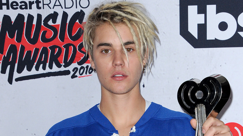 Justin Bieber poses for a photo
