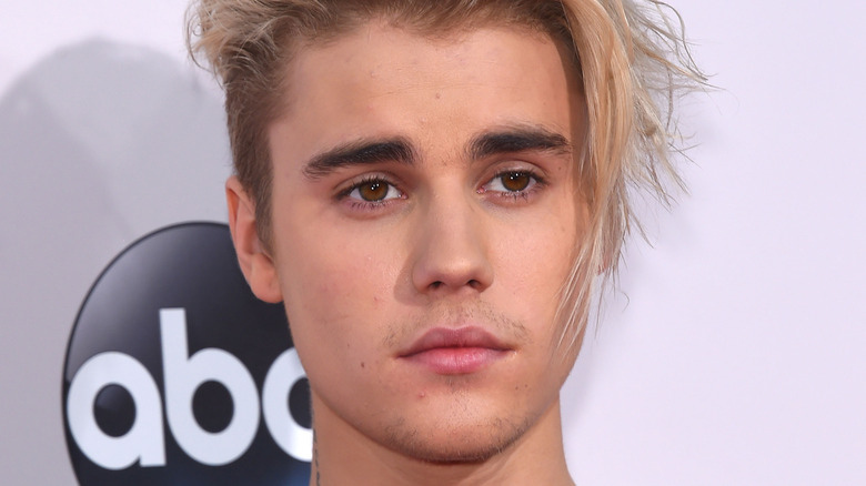 Justin Bieber poses for a photo