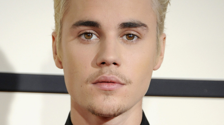 Justin Bieber poses for a photo