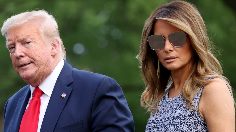 Donald and Melania Trump walking