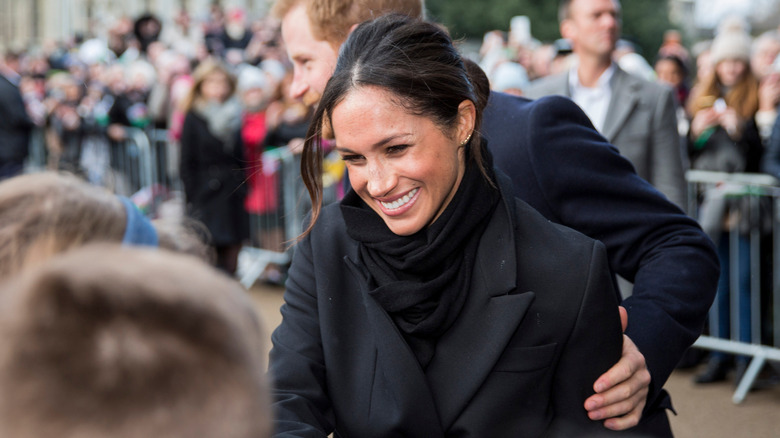 Meghan Markle grinning
