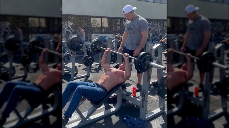 Robert F. Kennedy Jr. performing incline bench press outdoors