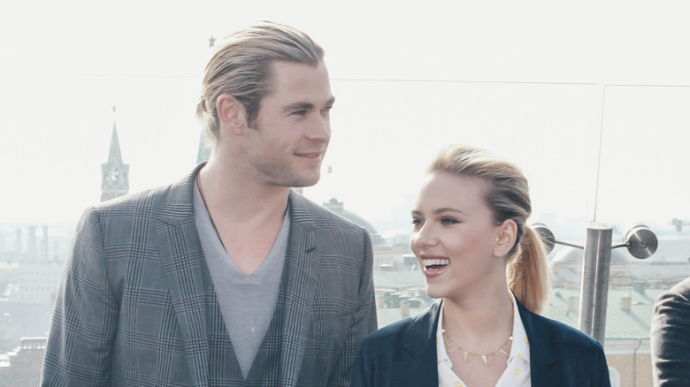 Chris Hemsworth and Scarlett Johansson smiling