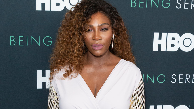 Serena Williams poses on a red carpet