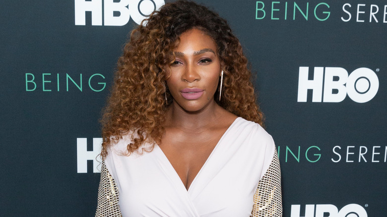 Serena Williams poses on a red carpet