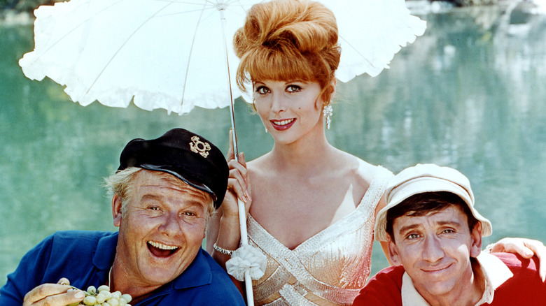 Tina Louise poses between Alan Hale Jr. and Bob Denver on Gilligan Island in 1964