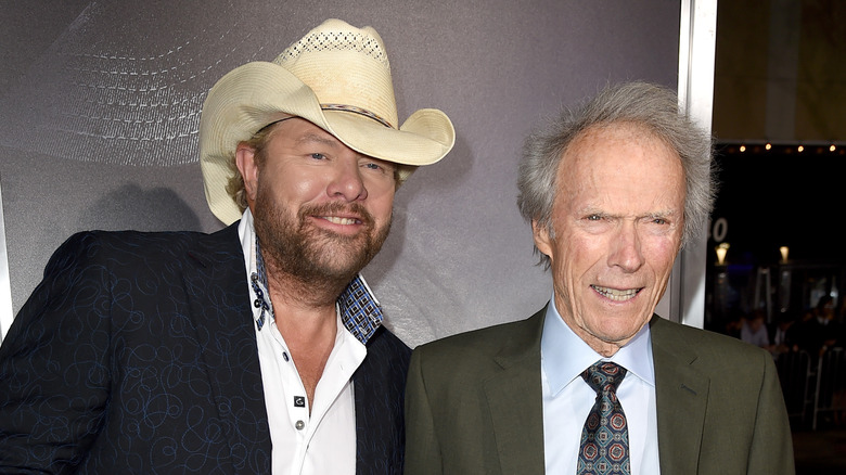 Toby Keith and Clint Eastwood smiling
