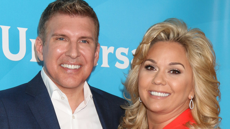 Todd and Julie Chrisley on the red carpet posing for cameras 