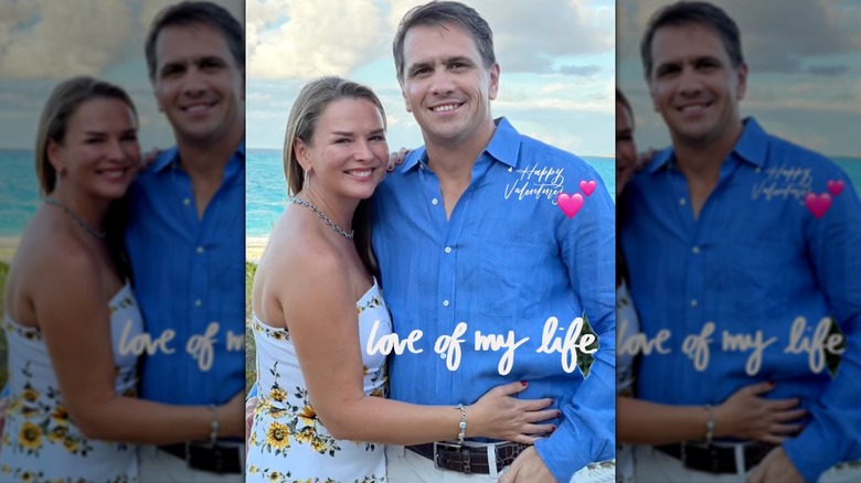 Todd Blanche and his wife Kristine smiling while posing on a beach together
