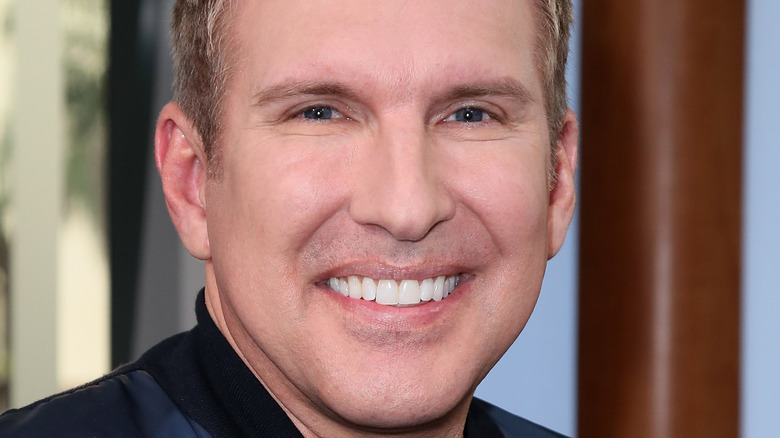 Todd Chrisley smiling for photo