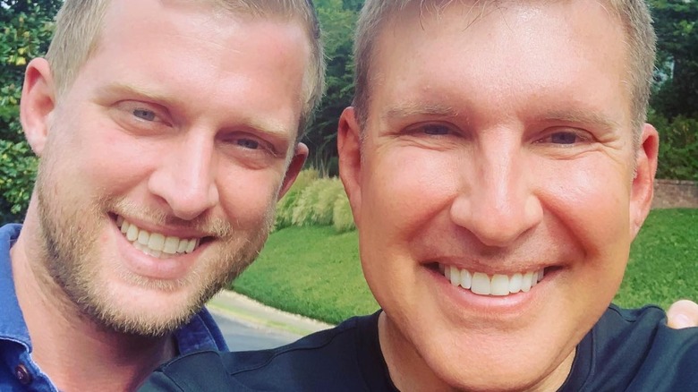 Kyle and Todd Chrisley smiling