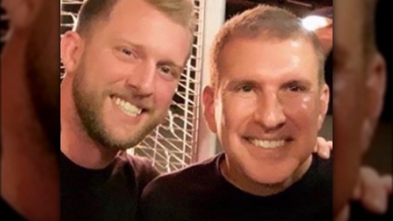 Kyle and Todd Chrisley smiling