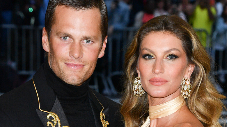 Tom Brady and Giselle Bundchen posing for photo