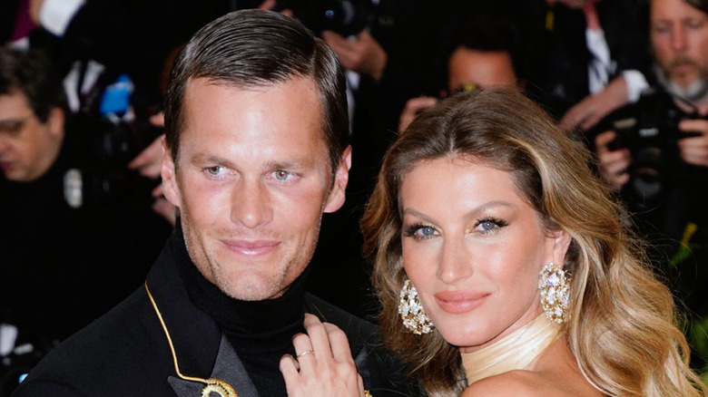 Tom Brady posing with Gisele Bundchen