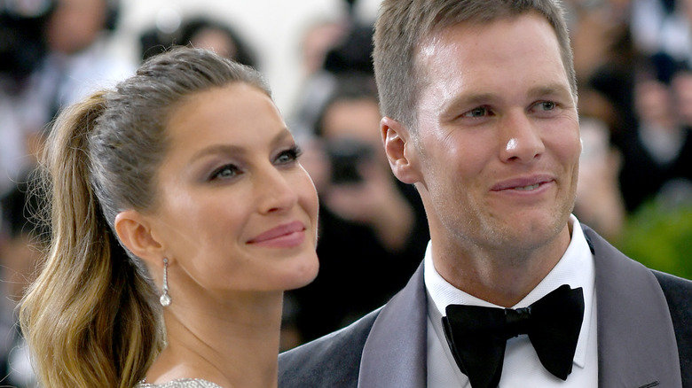 Tom Brady and Gisele Bündchen posing